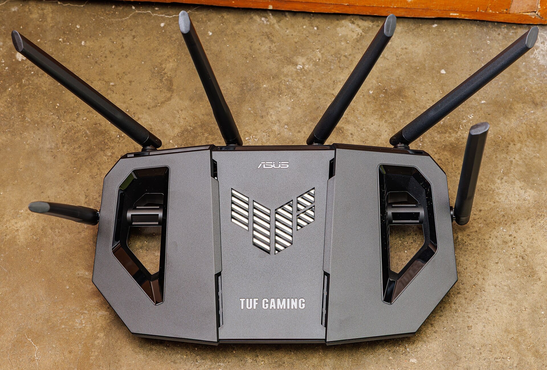 A wireless router with multiple external antennas viewed from above