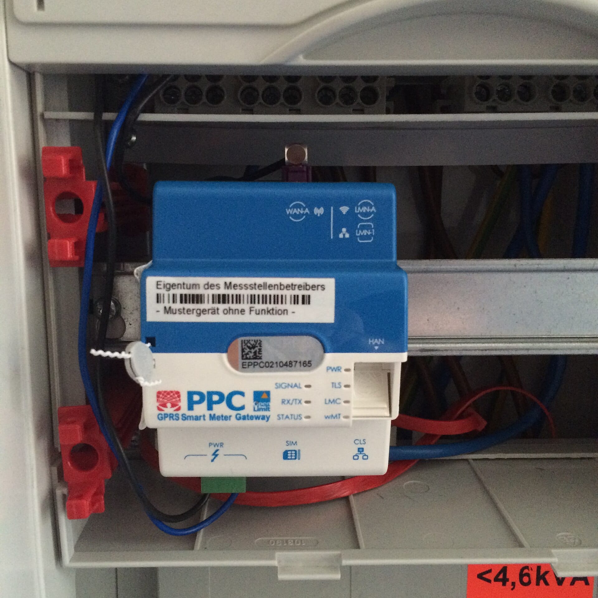 Smart meter gateway with GPRS, WiFi and LAN radio links mounted in a consumer unit beside meter wiring