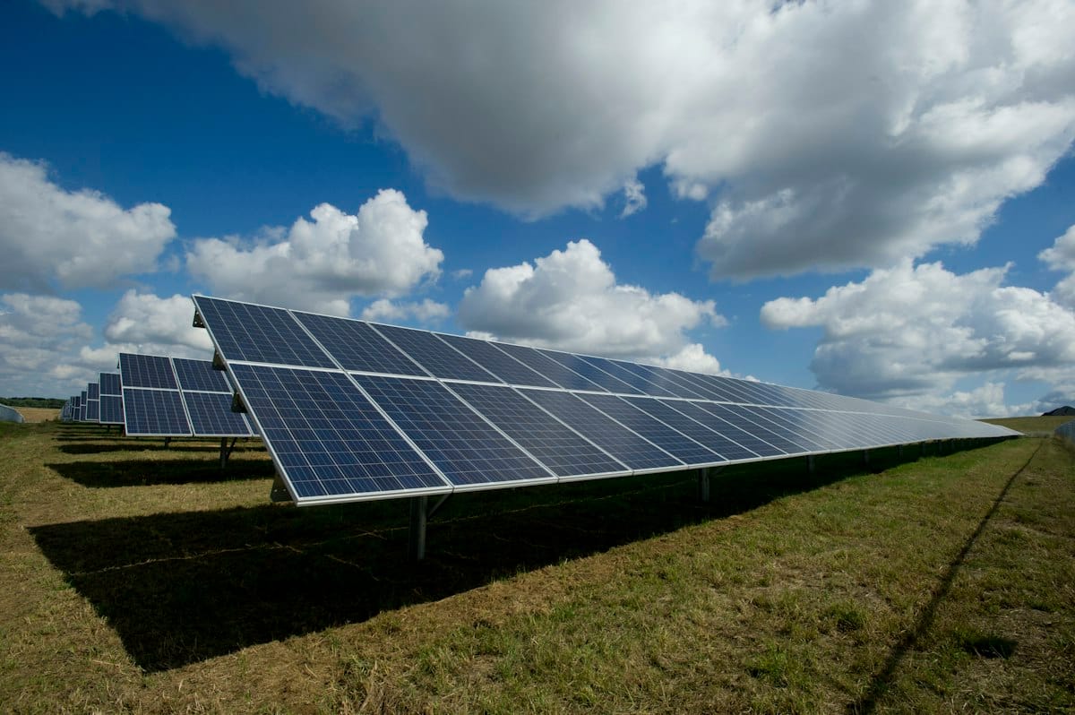 How Solar Panels Work in Nigeria — Complete Beginner's Guide (2026) 2 How solar panels work in Nigeria - panels under blue sky